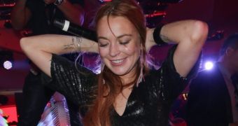 Lindsay Lohan makes a spectacle of herself in Cannes as she parties hard