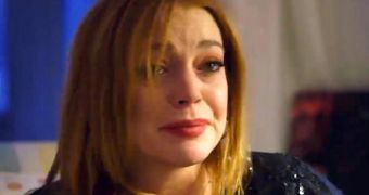 Lindsay Lohan gives a teary-eyed performance as she reveals she suffered a miscarriage