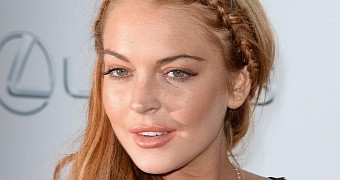 Lindsay Lohan claims she handled Whitney Houston's dead body