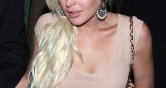 Lindsay Lohan crashed her rental Porsche into the back of an 18-wheeler