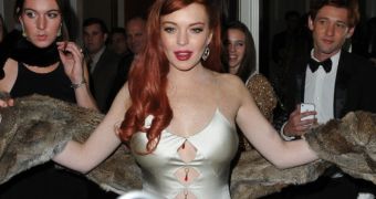 Lindsay Lohan on the red carpet at the premiere of “Liz & Dick,” the Lifetime biopic on Elizabeth Taylor