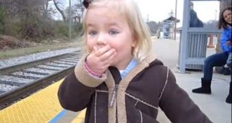 Madeline Dubois waits for the train on her third birthday