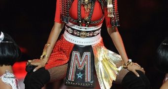 M.I.A. performed with Madonna at the Super Bowl, offended many by flipping the bird