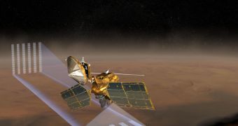 This artist's concept of NASA's Mars Reconnaissance Orbiter at Mars features one of its instruments -- the Mars Climate Sounder -- in action