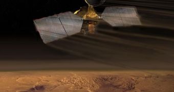 An artist depicts his view of the Mars Reconnaissance Orbiter in its aerobraking stage