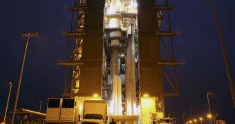 The Atlas V rocket set to launch the MSL mission is illuminated inside the Vertical Integration Facility at CCAFS' Space Launch Complex 41