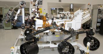 The Curiosity rover is about 3 meters (10 feet) long, and weighs nearly a ton. It's the most complex piece of equipment ever to be sent on Mars