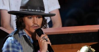 Johnny Depp accepts the MTV Generation Award at the MTV Movie Awards 2012