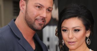 JWoww and her fiancé attend the 2013 MTV Movie Awards