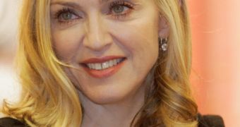 Pop star Madonna reportedly finds consolation after divorce in the arms of model Jesus Luz