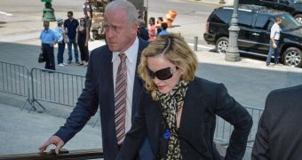 Madonna shows up for jury duty in New York, is sent home because she's too famous