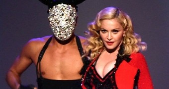 Madonna performs at the Grammys 2015 with masked dancer