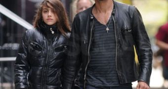 Lourdes and her father, Carlos Leon, seen out walking