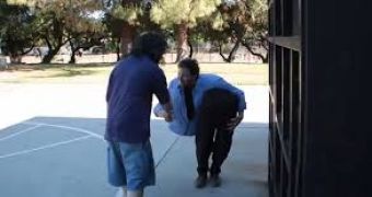 Magician Andy Gross puts on body cut in half prank