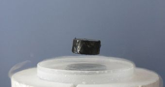A magnet levitating above a superconductor