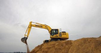 Malaysian authorities use excavator to destroy PCs used for illegal online gambling