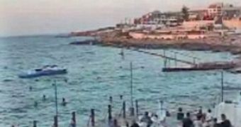 Runners fall from greasy pole during Maltese ritual