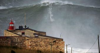 Garrett McNamara surfs on 100-ft (30-m) wave