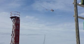 Helicopter drops cash over small town