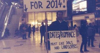 Man Parades Around London with “Hot Brunette Wanted for 2014” Sign