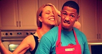 Mariah Carey is turning to alcohol to get over her split from Nick Cannon