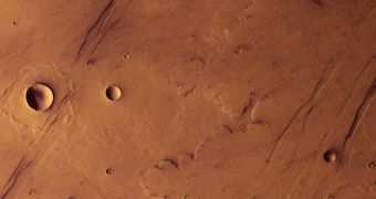 Daedalia Planum, located only 1,000 kilometers from Arsia Mons volcano