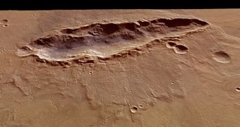 This unnamed elongated depression is located just to the south of the much larger Huygens crater