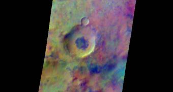 Pastel colors swirl across Mars, revealing differences in the composition and nature of the surface in this false-color infrared image taken on May 22, 2009