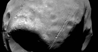 Phobos formed through coalescing of debris ejected into Martian orbit by a powerful asteroid collision