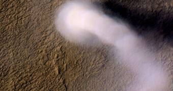 A Martian dust devil roughly 12 miles (20 kilometers) high was captured winding its way along the Amazonis Planitia region of Northern Mars on March 14, 2012