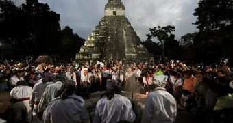 Tourists gather by the thousands at the Tikal temple, in Guatemala, for doomsday