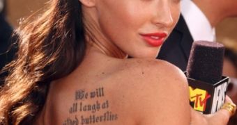 Megan Fox says if Angelina Jolie can have tattoos and a career, so can she