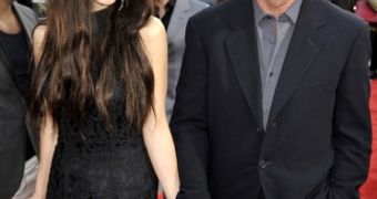 Mel Gibson and 3-month pregnant Oksana Grigorieva attend the “Wolverine” premiere