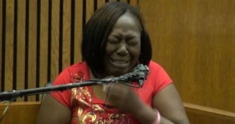Mertilla Jones gets choked up during testimony of how her 7-year-old granddaughter was shot and killed in home raid