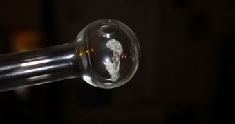 Pipe used for smoking methamphetamine with crystal meth melted inside