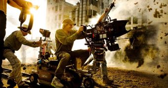 Director Michael Bay says “Transformers: Age of Extinction” will be more “cinematic” and “less goofy” than the third installment