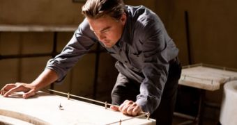 Cobb (Leonardo DiCaprio) spinning the top to see if it drops and he’s back in the real world