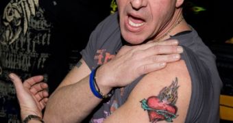 Michael Lohan shows off his brand new arm tattoo