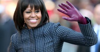 Michelle Obama jokes she got bangs because she was going through mid-life crisis