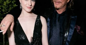 Evan Rachel Wood denies she and Mickey Rourke are more than just friends