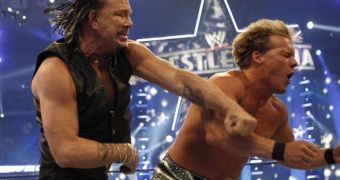 Mickey Rourke knocking down Chris Jericho at Wrestlemania