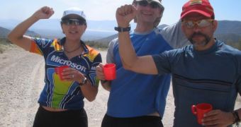 Members of Microsoft?s Unlimited Potential team celebrate after training in the Mojave Desert for the Gobi March