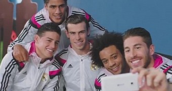 Real Madrid players taking a selfie with a Windows Phone device