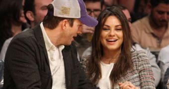 Mila Kunis is reportedly giving birth to a baby girl this October