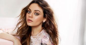 Mila Kunis says she loves being pregnant because she has “amazing” breasts now