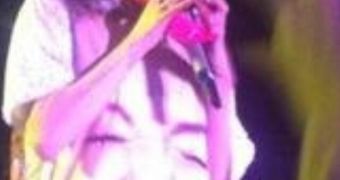 Miley Cyrus munches on a fan's thong during her concert
