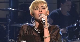 Miley Cyrus gets very emotional while performing “Wrecking Ball” on SNL