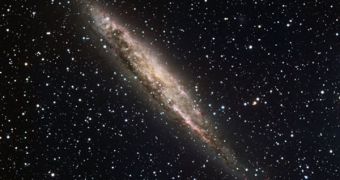 The recent image of NGC 4945 shows the large spiral galaxy edge-on