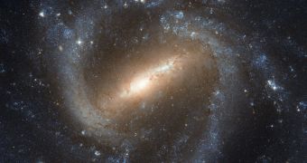 This is Hubble's view of the barred spiral galaxy NGC 1073