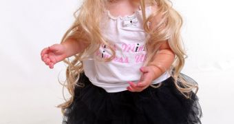 Miss Mini Princess Wears Make-up and a Wig in Beauty Pageant